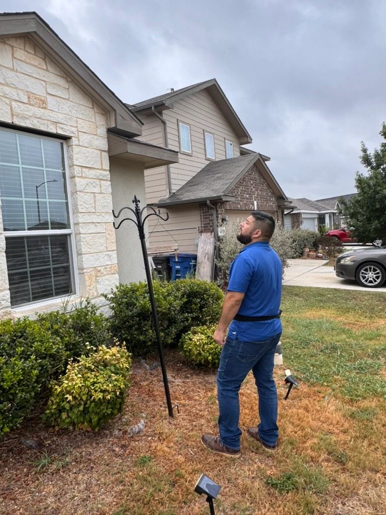 Inspector examining foundation